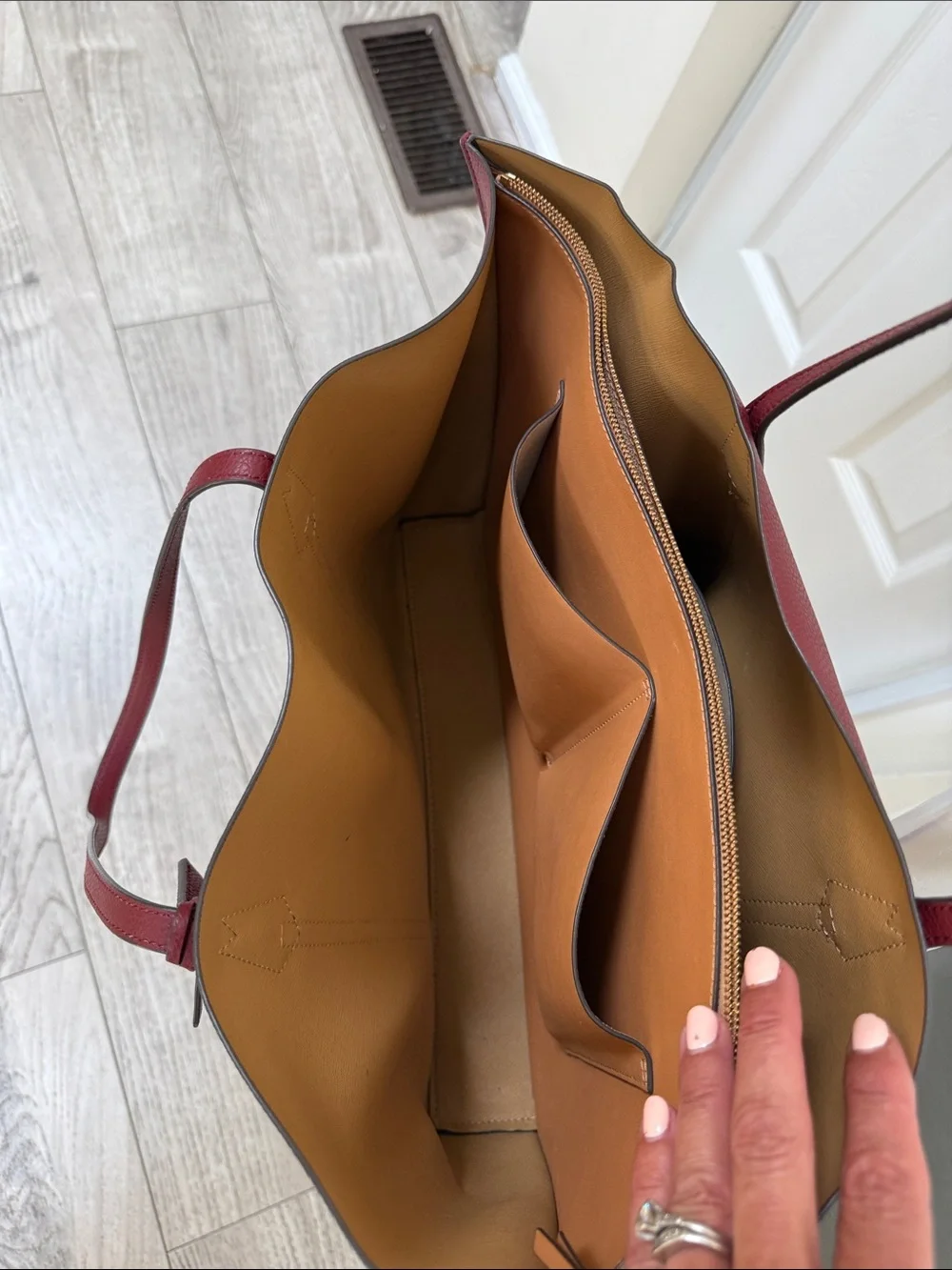 Tory Burch Wine Red Pebbled Leather Tote with Gold Logo Charm